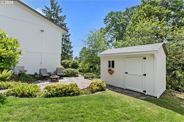 6985 SW Florence Ln, Portland, OR 97223 - view of green lawn featuring a patio and a shed