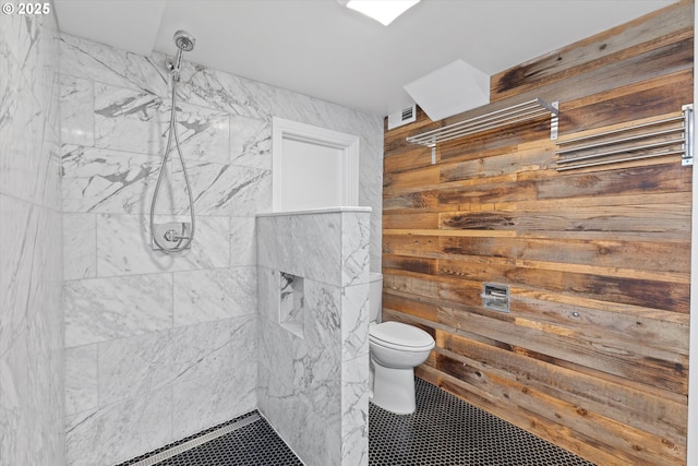 6815 N Smith St, Portland, OR 97203 - full bath featuring a tile shower, toilet, and wooden walls
