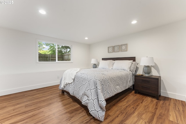 6516 SE 17th Ave, Portland, OR 97202 - bedroom with baseboards, wood finished floors, and recessed lighting