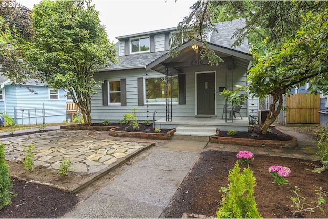 6516 SE 17th Ave, Portland, OR 97202 - view of front facade with a shingled roof and a porch