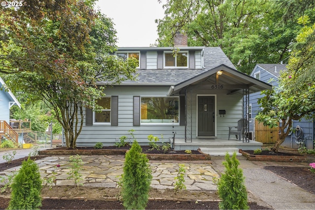 6516 SE 17th Ave, Portland, OR 97202 - view of front facade featuring a chimney and a shingled roof