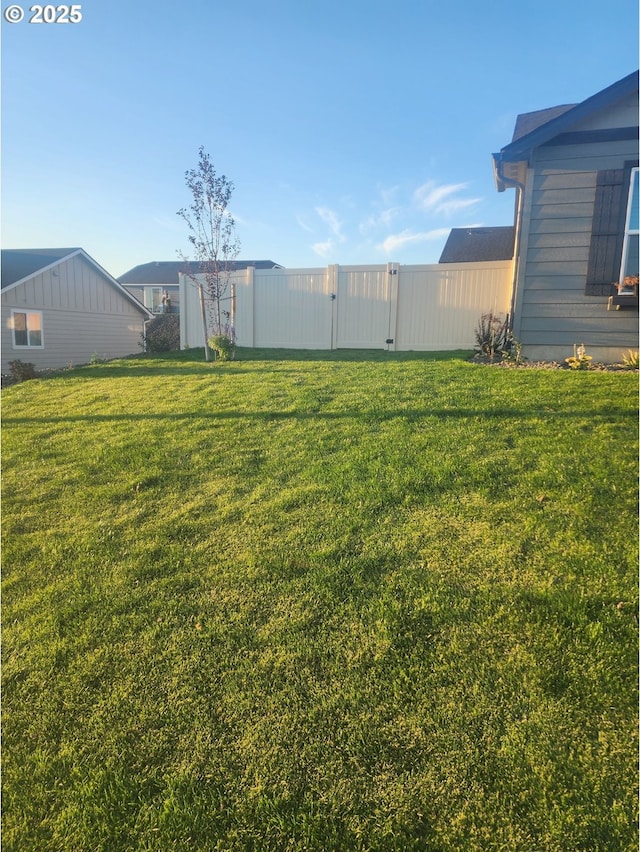 view of yard with fence