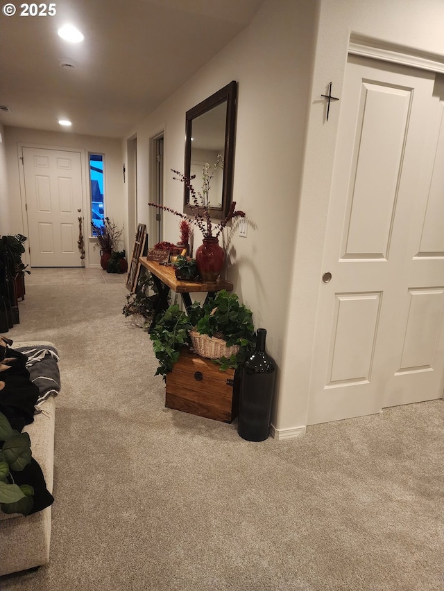 hall with carpet and recessed lighting