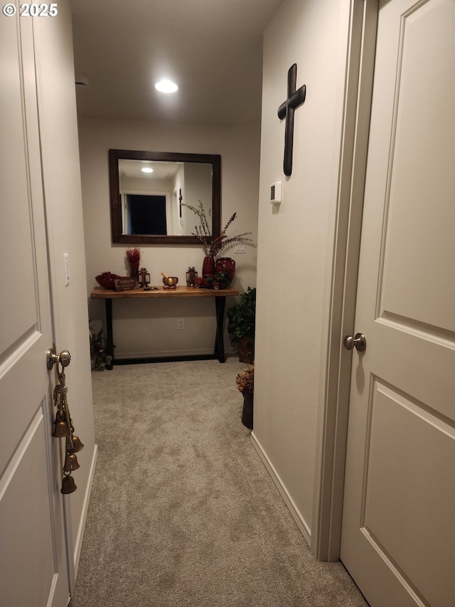 corridor with carpet, baseboards, and recessed lighting