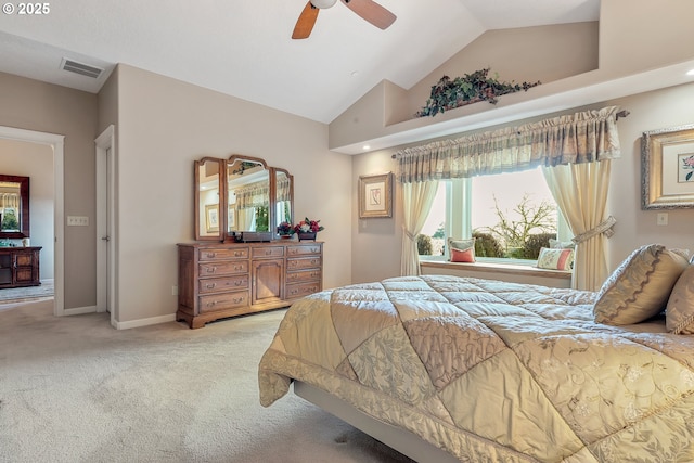 carpeted bedroom with ceiling fan and lofted ceiling