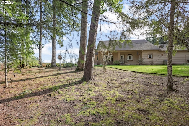 view of yard featuring central AC unit