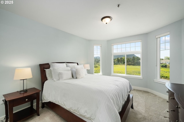 1108 S Holladay Dr Unit 24, Seaside, OR 97138 - carpeted bedroom featuring baseboards