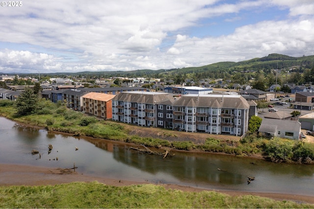 1108 S Holladay Dr Unit 24, Seaside, OR 97138 - drone / aerial view of a water and mountain view