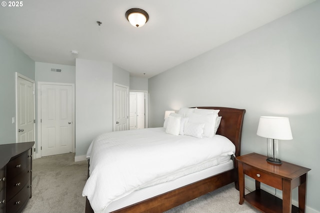 1108 S Holladay Dr Unit 24, Seaside, OR 97138 - bedroom with light colored carpet and a closet