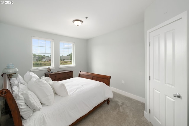 1108 S Holladay Dr Unit 24, Seaside, OR 97138 - carpeted bedroom with baseboards