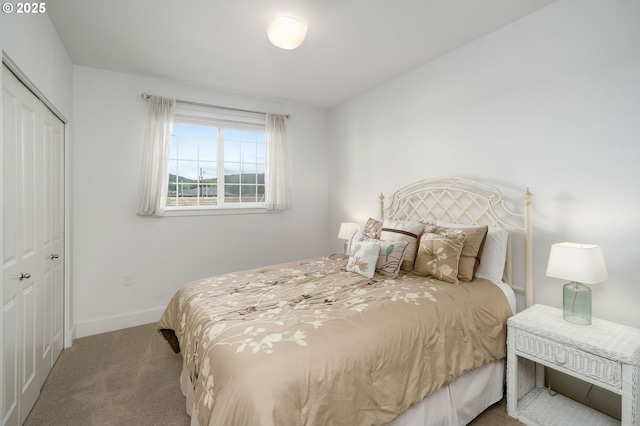 1108 S Holladay Dr Unit 24, Seaside, OR 97138 - carpeted bedroom with a closet and baseboards