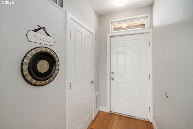 1108 S Holladay Dr Unit 24, Seaside, OR 97138 - entrance foyer with light wood-type flooring and baseboards