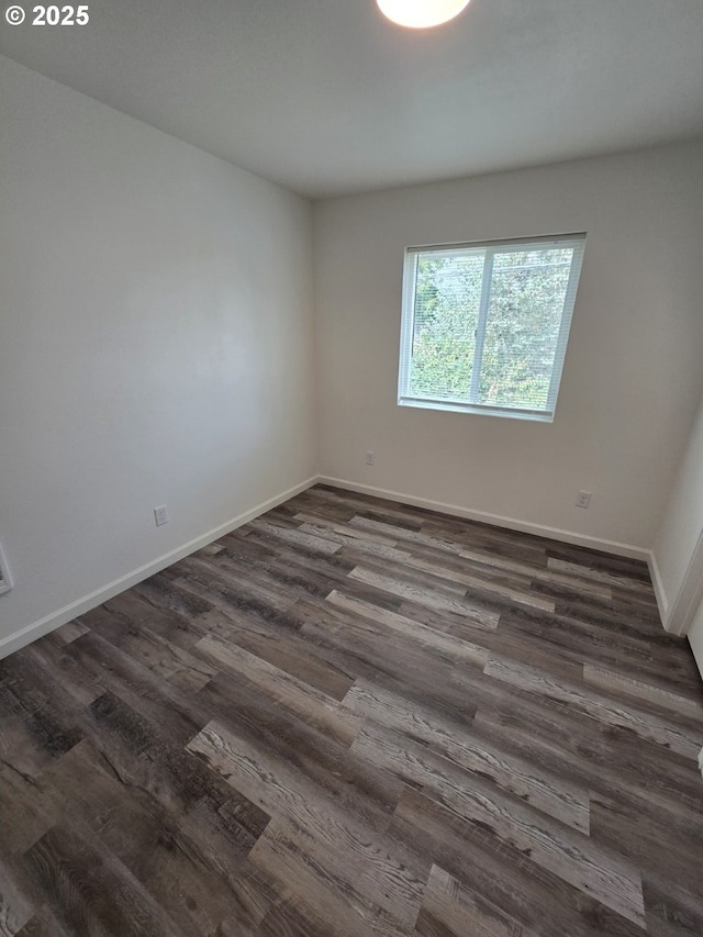 3461 Concord St, Eugene, OR 97402 - unfurnished room featuring dark wood-style floors and baseboards