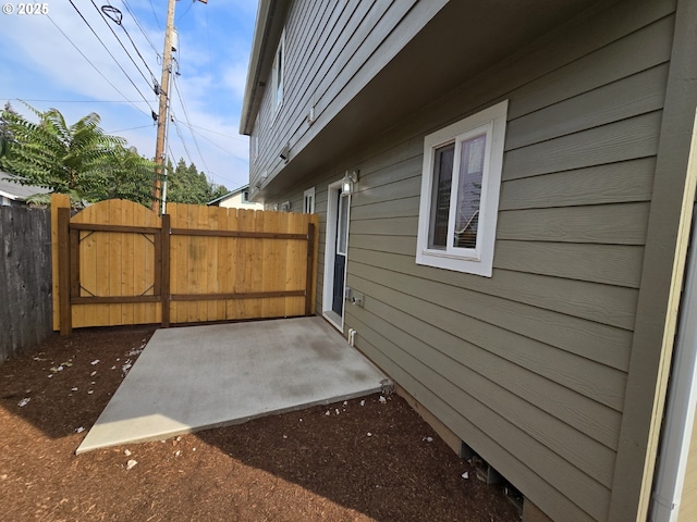 3461 Concord St, Eugene, OR 97402 - view of side of property with a patio and a gate