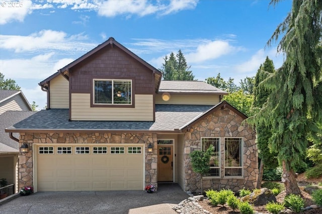7444 SE 114th Ave, Portland, OR 97266 - view of front of home featuring stone siding, roof with shingles, and asphalt driveway
