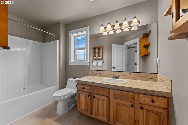 7444 SE 114th Ave, Portland, OR 97266 - full bathroom featuring toilet, vanity, shower / bath combination, and tile patterned flooring