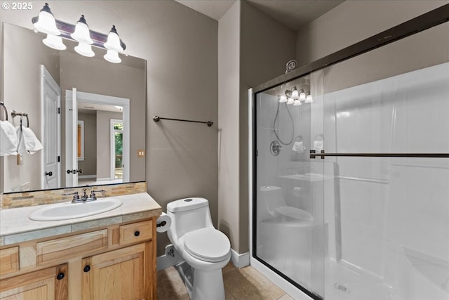 7444 SE 114th Ave, Portland, OR 97266 - bathroom with a stall shower, toilet, vanity, and tile patterned flooring