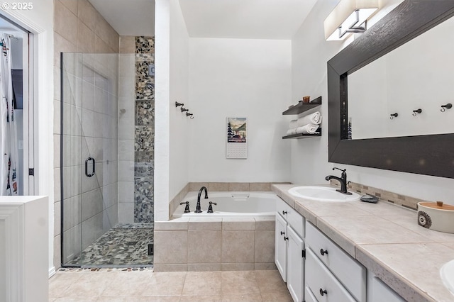 11255 SW Chickadee Ter, Beaverton, OR 97007 - bathroom with a shower stall, a garden tub, double vanity, and tile patterned flooring