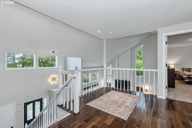 11255 SW Chickadee Ter, Beaverton, OR 97007 - hall featuring an upstairs landing, hardwood / wood-style floors, and high vaulted ceiling