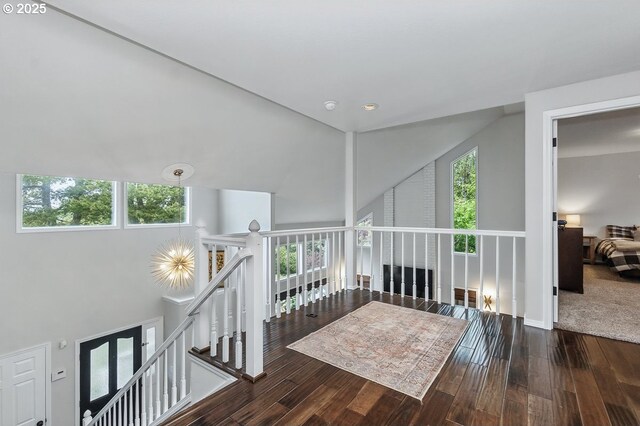 11255 SW Chickadee Ter, Beaverton, OR 97007 - corridor featuring an upstairs landing, hardwood / wood-style floors, and high vaulted ceiling