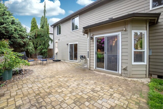 11255 SW Chickadee Ter, Beaverton, OR 97007 - rear view of property with a patio and fence