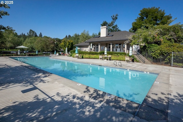 11255 SW Chickadee Ter, Beaverton, OR 97007 - community pool with stairway, fence, and a patio