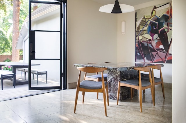 dining room with plenty of natural light