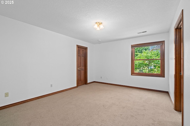 10670 NW La Cassel Crest Ln, Portland, OR 97229 - unfurnished room featuring light colored carpet and a textured ceiling