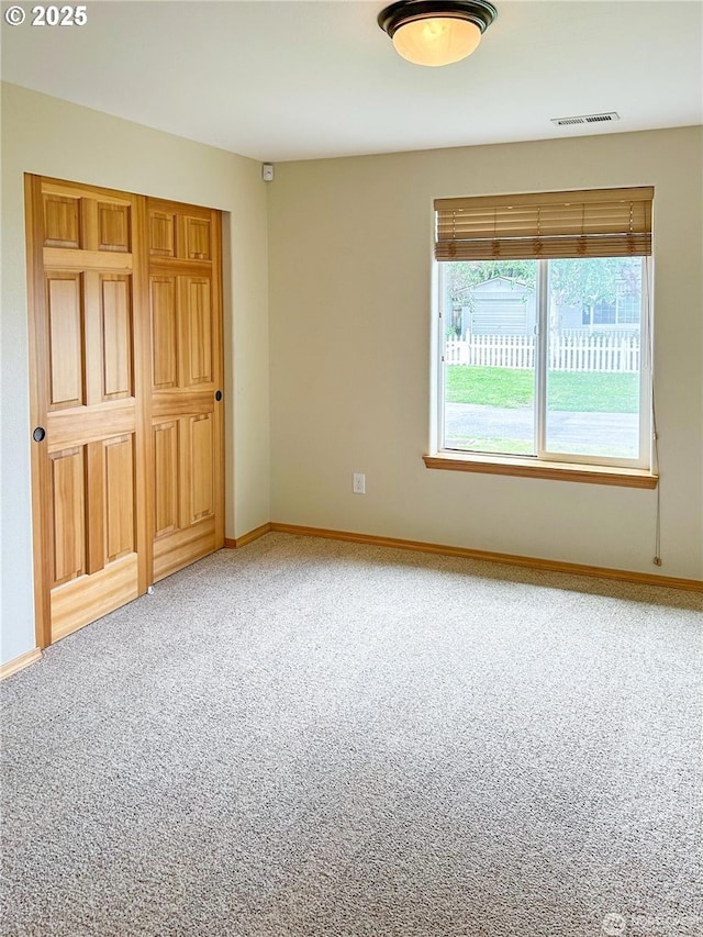 510 Oregon Ave N, Long Beach, WA 98631 - unfurnished bedroom featuring carpet flooring and a closet