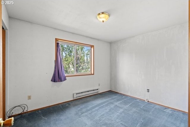 387 E Linden Way, Heppner, OR 97836 - spare room with baseboard heating and carpet flooring