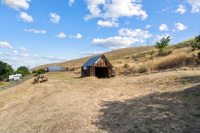 387 E Linden Way, Heppner, OR 97836 - view of pole building featuring a view of countryside