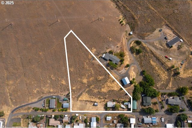 387 E Linden Way, Heppner, OR 97836 - aerial overview of property's location with rural landscape and property parcel outlined