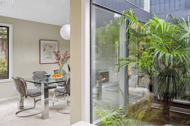 interior space with outdoor dining area and a patio area