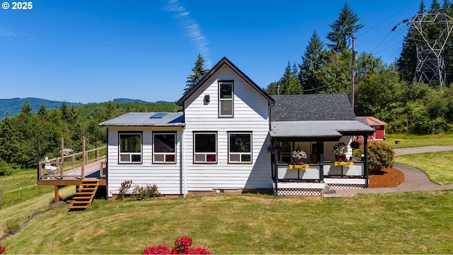 3412 NE 399th St, La Center, WA 98629 - back of house featuring covered porch, a lawn, stairs, and a deck with mountain view