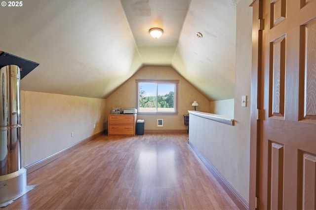 3412 NE 399th St, La Center, WA 98629 - bonus room with wood finished floors, lofted ceiling, and baseboards