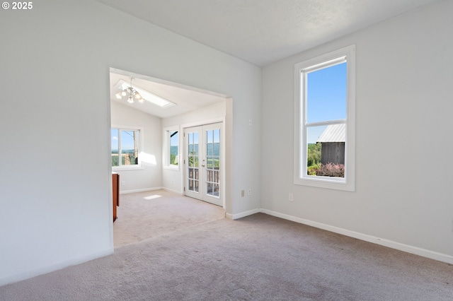 3412 NE 399th St, La Center, WA 98629 - unfurnished room with carpet flooring, french doors, baseboards, and vaulted ceiling