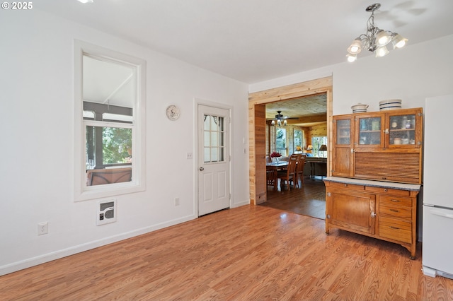 3412 NE 399th St, La Center, WA 98629 - dining room featuring plenty of natural light, light wood-style flooring, and a chandelier