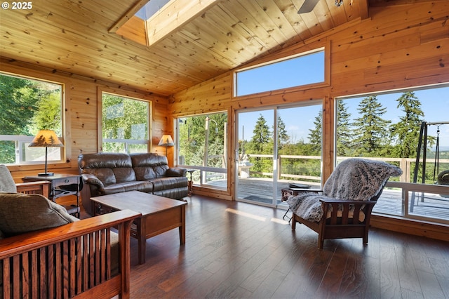 3412 NE 399th St, La Center, WA 98629 - living room featuring lofted ceiling, a skylight, wooden walls, wood ceiling, and wood-type flooring