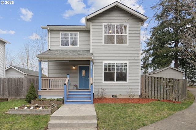 view of front property featuring a front lawn and covered porch