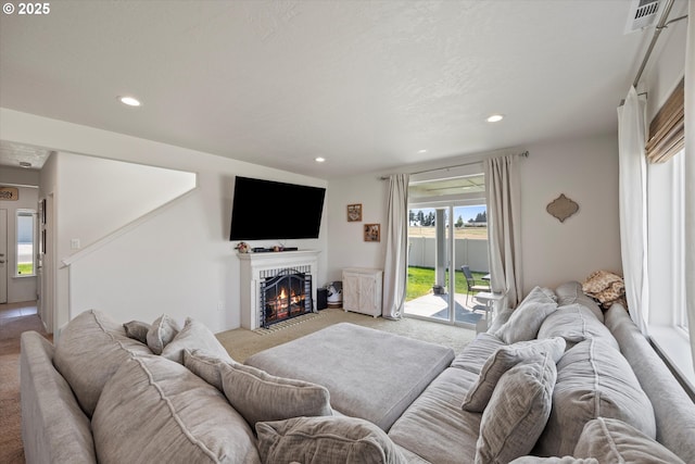 3 Patty Cir, Milton-Freewater, OR 97862 - living area with light carpet, recessed lighting, and a fireplace with flush hearth