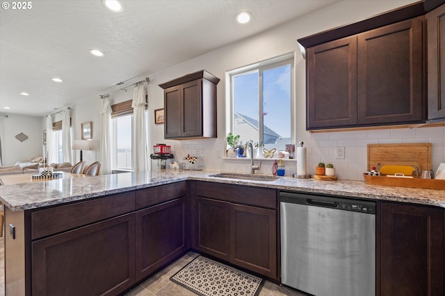 3 Patty Cir, Milton-Freewater, OR 97862 - kitchen with dishwasher, a sink, a peninsula, recessed lighting, and decorative backsplash
