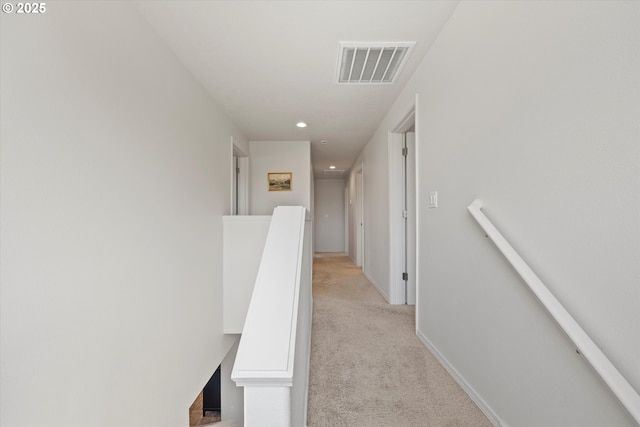 3 Patty Cir, Milton-Freewater, OR 97862 - hallway with light carpet, an upstairs landing, recessed lighting, and baseboards