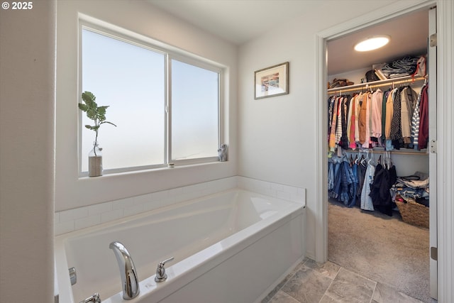 3 Patty Cir, Milton-Freewater, OR 97862 - bathroom featuring healthy amount of natural light, a bath, and a spacious closet