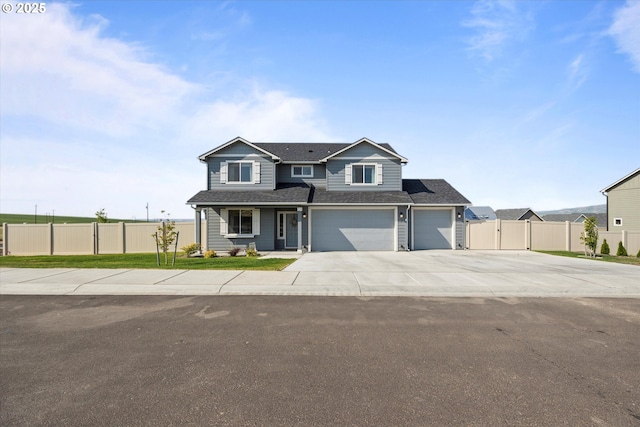 3 Patty Cir, Milton-Freewater, OR 97862 - traditional-style house featuring driveway, a shingled roof, a garage, and covered porch