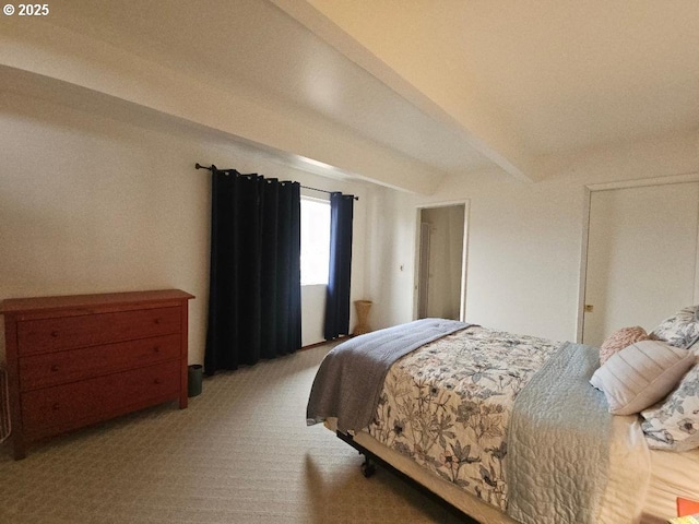 carpeted bedroom featuring beam ceiling