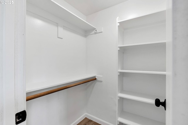 20 NW 16th Ave Unit 4, Portland, OR 97209 - walk in closet featuring wood finished floors