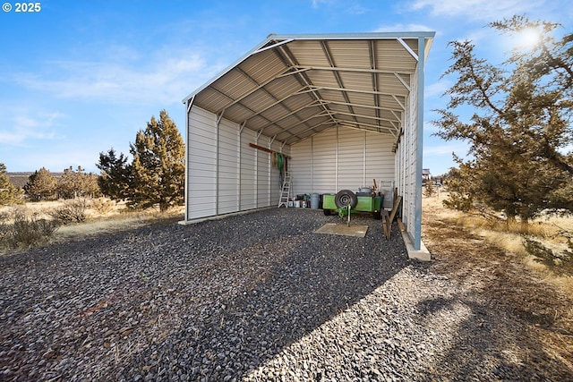 view of outdoor structure with a carport