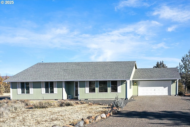 ranch-style home with a garage