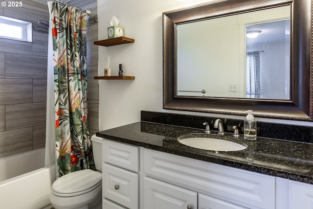 bathroom with vanity, toilet, shower / bath combination with curtain, and a textured wall