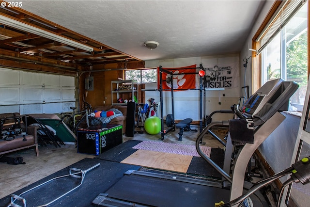 workout area with a garage